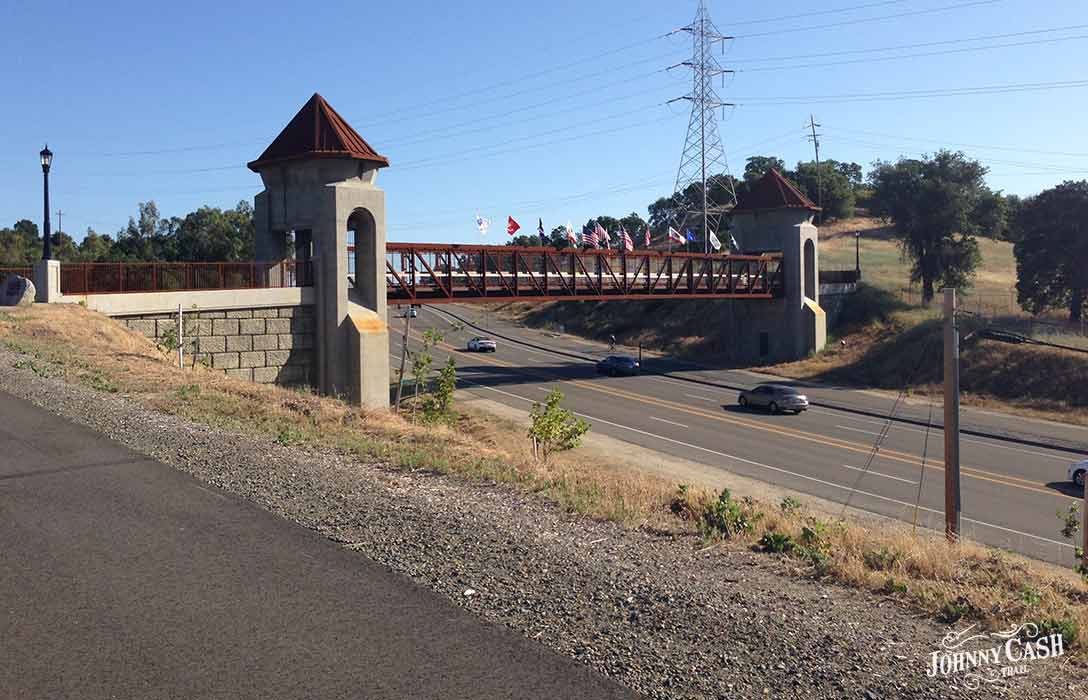 Image features the Johnny Cash Trail Overpass Bridge in Folsom, CA.